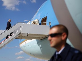 President Donald Trump boards Air Force One at Andrews Air Force Base, Md., Friday, June 9, 2017. Trump is scheduled to spend the weekend at Trump National Golf Club in Bedminster, N.J. (AP Photo/Patrick Semansky)