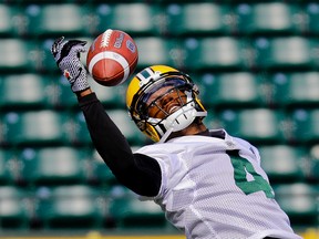 Eskimos receiver Adarius Bowman, who lends his name to a program for autistic students in Edmonton schools, is following in teh footsteps of the late Larry Highbaugh, who spent the last two decades teaching and working closely with autistic students in Snelville, Ga. (Larry Wong)
