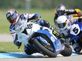 Ben Young of Collingwood leads Bodhi Edie of Sask. and Jordan Szoke of Lynden Ont, in the second half in the MOPAR CSBK Superbike Championship race at the Grand Bend Motorplex on Sunday June 11, 2017. Szoke ended up in second behind Edie after Young fell on lap 18 of 20 ending the race. This was the first national level motorcycle race at the Motorplex said owner Paul Spriet, who was happy with the turnout to watch the racing on their 2.25km course. (MIKE HENSEN, The London Free Press)