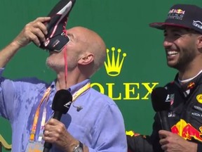 Patrick Stewart drinks Champagne out of the shoe of Formula One driver Daniel Ricciardo during the Canadian Grand Prix on Sunday. (YouTube/Formula 1)