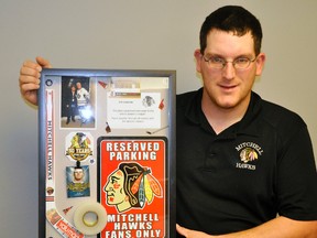 Tim Horton announced his retirement after 10-years as equipment manager of the Mitchell Jr. C Hawks. He recently received this gift thanking him for his work and dedication over the years. ANDY BADER/MITCHELL ADVOCATE