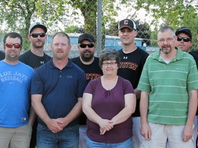 Members of the Mitchell Coyotes slo-pitch team pose with representatives of the Mitchell Minor Sports last week, thanking them for their involvement. Pictured back row (left): Jamie Daum, Wayne Regele (ringette), Jason King, Luke Sheps, Matt Feeney, Chad Furtney, Andrew Daub, Don Hunter, Rob Archambault and Mike Bean. Front row (left): Kevin Cardno, Dean Smith (MMS president), Adam Wolfe (baseball), Greg Van Bakel (hockey), Sherri Jordan (director), Richard Boyce (soccer), Rob Lealess and Ryan Campbell. Coyotes absent included Jim Scott, Brian Richardson, Perry Francis, Tyler Smith, Trevor Brown, TJ Runhart, Jamy Poirier and John Baumbach. SUBMITTED