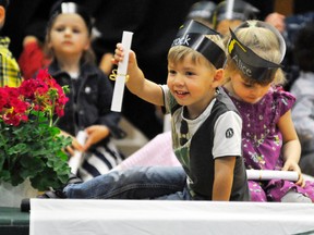 Brock Czajkowski shows off his well-earned nursery school diploma to family members during the graduation ceremony from Perth Care for Kids last Tuesday, June 6 at Upper Thames Elementary School (UTES). ANDY BADER/MITCHELL ADVOCATE