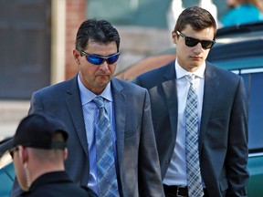 Joe Sala, right, arrives for his preliminary hearing on charges related to the hazing death of Timothy Piazza at Penn State's Beta Theta Pi fraternity at the Centre County Courthouse in Bellefonte, Pa., Monday, June 12, 2017. (AP Photo/Chris Knight)