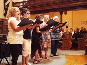 During the second annual Brent Powell Memorial Concert, on the left, part of the Huron Song Ensemble, Carolyn Powell sings May 28 at the First Presbyterian Church in Seaforth. Her son died last year from issues revolving around mental health. (Shaun Gregory/Huron Expositor)