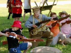 Bill Dineen from Goderich provides bayonet training for a few young visitors at the Ingersoll Cheese and Agricultural Museum on Sunday during the Vimy 100 event. (BRUCE CHESSELL/Sentinel-Review)