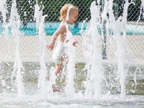 Luke Hendry The Intelligencer
Violet Jordan, 22 months, of Belleville runs through the water at the Kinsmen Splash Pad Monday.The City of Belleville is reminding residents of public facilities they can use if they need to cool off on hot, humid days.