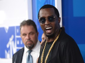 In this Aug. 28, 2016, file photo, Sean "Diddy" Combs arrives at the MTV Video Music Awards at Madison Square Garden in New York. On June 12, 2017, Forbes named Combs the top earner its list of the 100 highest paid celebrities. (Photo by Evan Agostini/Invision/AP, File)