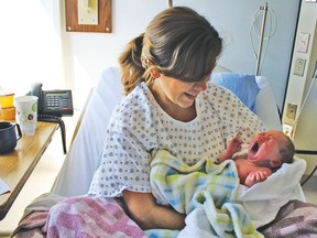 Mom Lisa Klippert with newborn daughter Cora-Lynn who was born in a pickup truck on the way to the hospital.