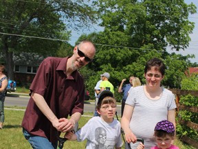 The Robinson family turns the sod for their new home being built by Haibitat for Humanity Sarnia/Lambton. (NEIL BOWEN/Sarnia Observer)