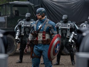 Captain America (Chris Evans, center), surrounded by HYDRA Soldiers in CAPTAIN AMERICA: THE FIRST AVENGER, from Paramount Pictures and Marvel Entertainment. (Courtesy of Paramount Pictures)