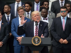 US President Donald Trump speaks as he welcomes the Clemson Tigers, the 2016 NCAA Football National Champions, at the White House in Washington, DC, on June 12, 2017. AFP PHOTO