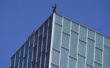 French urban climber, Alain Robert, also known as "French Spiderman", gestures after scaling the 120 metres (393 ft) Melia Barcelona Sky Hotel in Barcelona, Spain, Monday, June 12, 2017. (AP Photo/Manu Fernandez)
