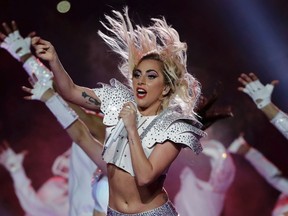 In this Feb. 5, 2017, file photo, Lady Gaga performs during the halftime show of the NFL Super Bowl 51 football game between the New England Patriots and the Atlanta Falcons in Houston. Starbucks announced June 12, 2017, that it's teaming with Gaga for a set of brightly colored summery drinks that will raise money for the singer’s foundation. (AP Photo/Matt Slocum, File)