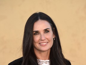 Actress Demi Moore arrives for the first cruise collection by Maria Grazia Chiuri for Dior show in the Upper Las Virgenes Canyon, Calabasas, California, on May 11, 2017. / AFP PHOTO / CHRIS DELMAS