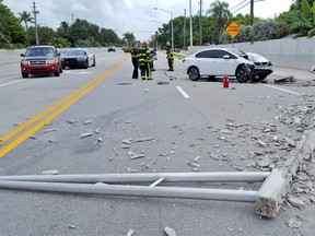 Broward Sheriff’s Office spokesman Mike Jachles tweeted that the crash happened Tuesday after the driver saw a spider loose in the car. (@BSO_Mike/Twitter photo)