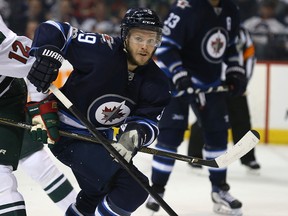 Toby Enstrom has agreed to waive his no-movement clause, so he can be exposed in the expansion draft by the Winnipeg Jets. Kevin King/Winnipeg Sun