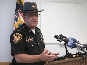 Stark County Sheriff George T. Maier speaks to reporters in Canton, Ohio on Tuesday, June 13, 2017. Maier said George Brinkman Jr., is the suspect in the killing of a mother and her two college-age daughters and a married couple in another city in northeastern Ohio. (AP Photo/Dake Kang)