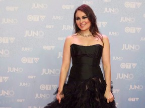Tanya Tagaq poses on the red carpet during the 2015 Juno Awards in Hamilton, Ont., on Sunday, March 15, 2015. Three albums focused on the historic mistreatment of Canada's indigenous people are among projects on this year's Polaris Music Prize long list. (THE CANADIAN PRESS/Peter Power)