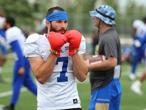 Wide receiver Weston Dressler wears boxing gloves during warmup at Winnipeg Blue Bombers training camp on the University of Manitoba campus in Winnipeg on Tues., June 13, 2017. Kevin King/Winnipeg Sun
