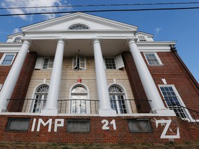 This November 2014, file photo, shows the Phi Kappa Psi house at the University of Virginia in Charlottesville, Va. (AP Photo/Steve Helber, File)
