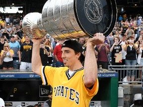 Marc-Andre Fleury brings the Stanley Cup out of the dugout before the game between the Pittsburgh Pirates and the Colorado Rockies at PNC Park on June 13, 2017. (Justin Berl/Getty Images)