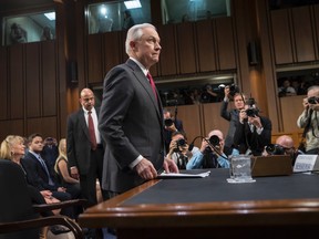 Attorney General Jeff Sessions arrives on Capitol Hill in Washington, Tuesday, June 13, 2017, to testify before the Senate Intelligence Committee hearing about his role in the firing of James Comey, his Russian contacts during the campaign and his decision to recuse from an investigation into possible ties between Moscow and associates of President Donald Trump. (AP Photo/J. Scott Applewhite)
