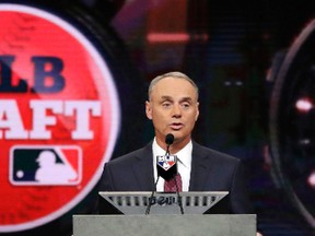 Commissioner Rob Manfred at the Major League Baseball draft, Monday, June 12, 2017, in Secaucus, N.J. (AP Photo/Julio Cortez)