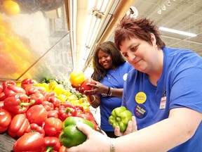 Jennifer Quesnel, Click and Collect manager, along with personal shopper Emilienne Nemem sort through some peppers at the Real Canadian Superstore in Sudbury, Ont. on Tuesday June 13, 2017. Gino Donato/Sudbury Star/Postmedia Network
