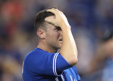 TORONTO, ON - JUNE 13: Jeff Beliveau #36 of the Toronto Blue Jays reacts as he walks off the mound and to his dugout at the end of the seventh inning during MLB game action against the Tampa Bay Rays at Rogers Centre on June 13, 2017 in Toronto, Canada. (Photo by Tom Szczerbowski/Getty Images)
