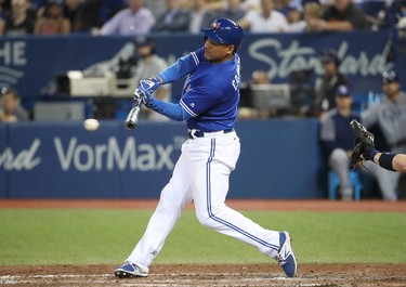 TORONTO, ON - JUNE 13: Ezequiel Carrera #3 of the Toronto Blue Jays hits an RBI single in the seventh inning during MLB game action against the Tampa Bay Rays at Rogers Centre on June 13, 2017 in Toronto, Canada. (Photo by Tom Szczerbowski/Getty Images)