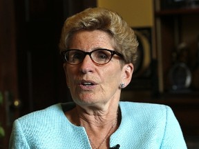 Ontario Premier Kathleen Wynne speaks with the Sun in her office at Queen's Park in Toronto on Tuesday, June 13, 2017. (Michael Peake/Toronto Sun)