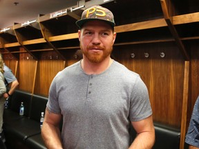 Ottawa Senators forward Chris Neil speaks to reporters as players clean out their lockers at the Canadian Tire Centre in Ottawa on May 27, 2017. (Patrick Doyle/Postmedia)