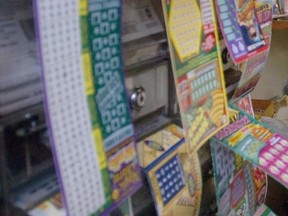 A Florida man is suing his friend for misleading him about the value of his $1 million lottery ticket. (AP Photo/Files)