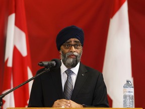 Defence Minister Harjit S. Sajjan speaks about Canada’s priorities in the space and cybersecurity as part of Canada’s new defence policy at 3 Division Support Base Edmonton at CFB Edmonton on Wednesday, June 14, 2017. Ian Kucerak / Postmedia