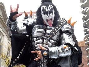 Gene Simmons of Kiss sticks his tongue out as the band comes down Central Park West during the 88th Macy's Thanksgiving Day Parade in New York on November 27, 2014. Kiss performed a medley of their hits for an estimated 3.5 million people who lined the parade route. (TIMOTHY A. CLARY/AFP/Getty Images)