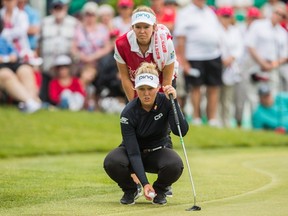Brooke Henderson lines up a putt during the Manulife Canadian Open last week. (THE CANADIAN PRESS)