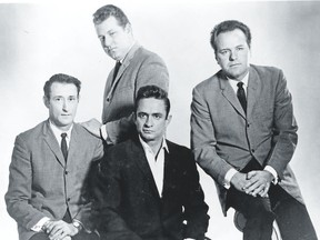Johnny Cash, centre, and the Tennessee Three, from left, lead guitarist Luther Perkins, drummer W.S. Fluke Holland and bass player Marshall Grant. (Special to Postmedia News)