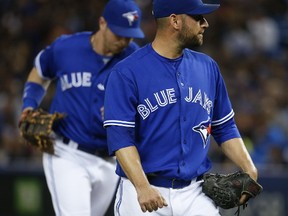 Toronto Blue Jays pitcher Marco Estrada walks off the field after giving up four runs in the first inning in Toronto on June 1, 2017. (Jack Boland/Toronto Sun/Postmedia Network)