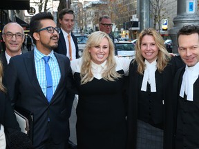 Rebel Wilson poses with her legal team as they leave the Victorian Supreme Court on June 15, 2017 in Melbourne, Australia. After a three week trial, a jury of six has returned unanimous verdicts in favour of Wilson. Rebel Wilson launched action Bauer Media, the publisher of Woman's Day, over a series of articles she alleges portrayed her as a serial liar and cost her movie roles in Hollywood. (Photo by Scott Barbour/Getty Images)