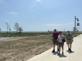 Floyd, Dianne and Glenn Donald take a stroll down the west side of Port Stanley’s Hofhuis Park Wednesday afternoon. (Jennifer Bieman/Times-Journal)