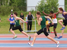 Athletes compete in a boys 110-metre hurdles race at the Royal Canadian Legion District H track and field meet at the track at Laurentian University in Sudbury, Ont. on Saturday June 10, 2017. John Lappa/Sudbury Star/Postmedia Network