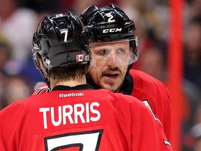 Kyle Turris and Dion Phaneuf confer in the second period as the Ottawa Senators take on the Pittsburgh Penguins in Game 4 of the NHL Eastern Conference Final at the Canadian Tire Centre on May 19, 2017. (Wayne Cuddington/Postmedia)