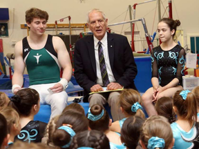 World-acclaimed architect Douglas Cardinal talks to members of the Tumblers Gymnastic club after the announcement of a new world class sports facility is to be built in Orleans, June 15, 2017. (Jean Levac, Postmedia)