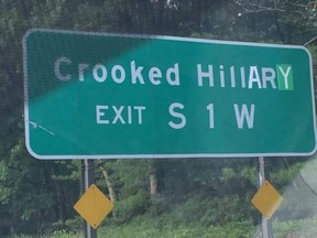 A roadside on the side of the Sagtikos Parkway is seen defaced to read 'Crooked Hillary' (Twitter/@ChrisBiv)