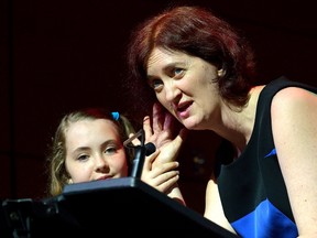 Author Emma Donoghue does a reading with her daughter, Una Roulston, at London Central Library?s Wolf Performance Hall Thursday. MORRIS LAMONT/THE LONDON FREE PRESS