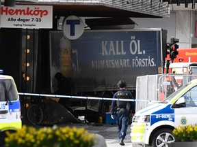Police cordons a truck used in an act of terrorism in central Stockholm, April 7, 2017. AFP PHOTO