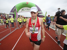 Bradley Keefe won the Men's full marathon, at the Manitoba Marathon, in Winnipeg.   Sunday, June 19, 2016.   Sun/Postmedia Network