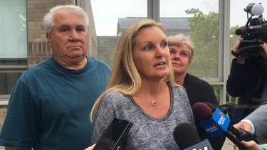 Christine Russell, widow of Toronto Police Sgt. Ryan Russell, speaks to media on Thursday, June 15, 2017 outside the Ontario Shores mental health facility in Whitby. (Jenny Yuen/Toronto Sun)