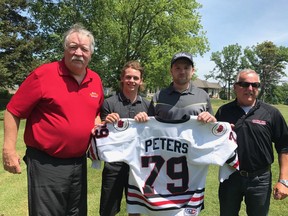 The Sarnia Legionnaires have retired the sweater of scoring ace Tyler Peters. Shown here, from left: general manager Bob Williamson, team captain Sam McCormack, Peters and head coach Mark Davis. (Handout)